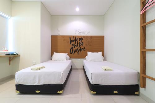 Katil atau katil-katil dalam bilik di Locus Rooms