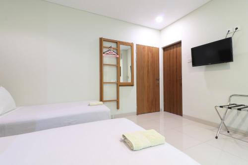 Televisyen dan/atau pusat hiburan di Locus Rooms