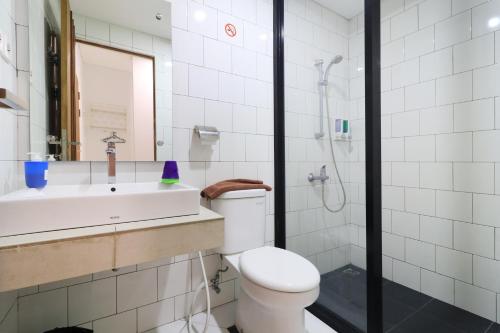 Koupelna v ubytování Locus Rooms