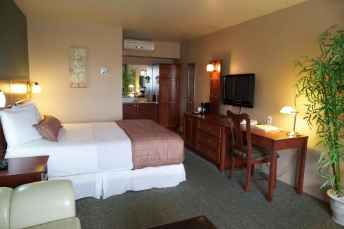 מיטה או מיטות בחדר ב-Hotel-Motel Drummond