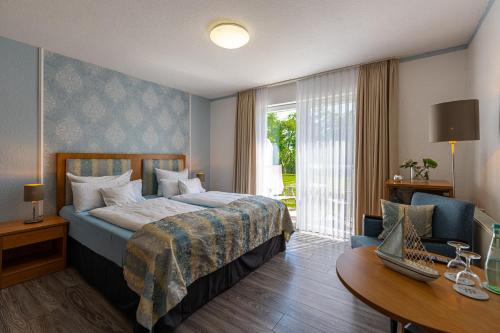 Postel nebo postele na pokoji v ubytování Hotel Nordstern