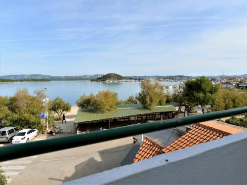 a view of a lake from a balcony at Apartments Helena in Murter