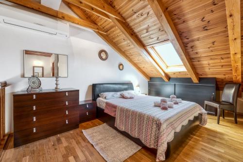 Postel nebo postele na pokoji v ubytování Penthouse Apartment Marija