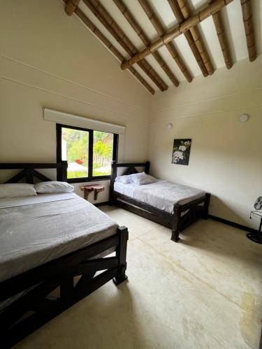 A bed or beds in a room at Fincas Panaca Jagüey 18