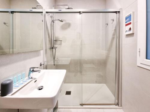 a bathroom with a shower and a sink at Buen Pastor Cathedral - Iberorent Apartments in San Sebastián