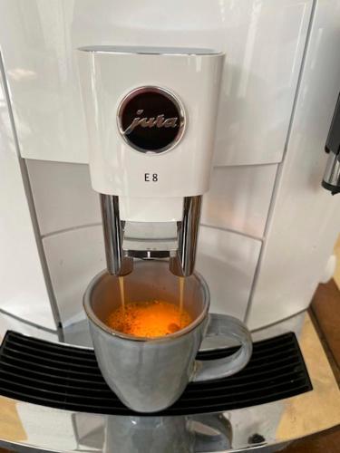 a coffee maker is making a cup of coffee at Room Tarifa in Tarifa