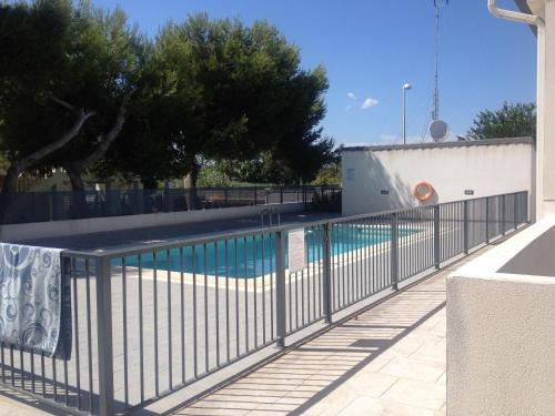 Πισίνα στο ή κοντά στο PLAYA ALMARDA,PISCINA,2 TERRAZAS,WIFI,PARKING,BBQ,TRANQUILo