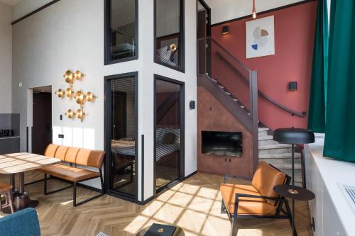 Χώρος καθιστικού στο Hotel de Timmerfabriek I Kloeg Collection