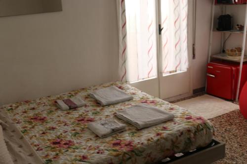 Postel nebo postele na pokoji v ubytování Venezia lovely rooms