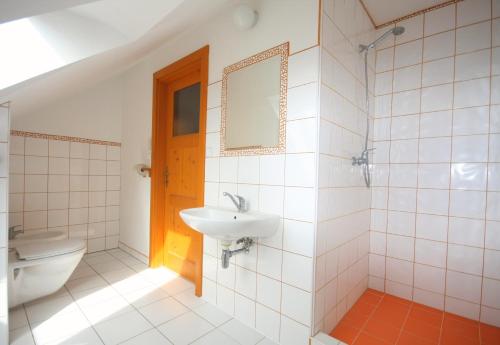 Kúpeľňa v ubytovaní Apartmán V sadu
