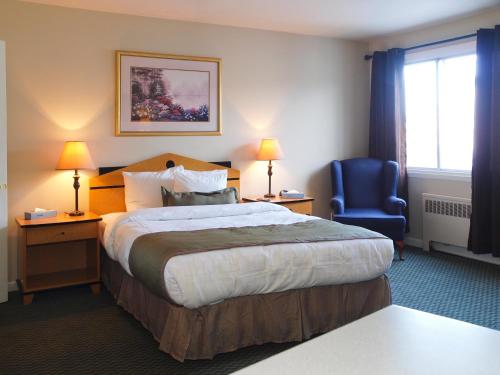 Ein Bett oder Betten in einem Zimmer der Unterkunft Beausejour Hotel Apartments/Hotel Dorval