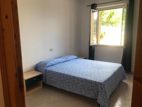 Cama o camas de una habitación en casa Alessia