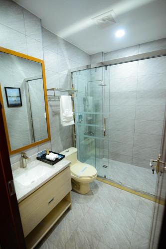 Ένα μπάνιο στο The Caye Hotel Caye Caulker