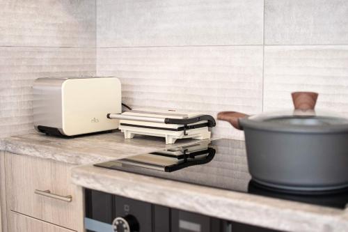 Dapur atau dapur kecil di Salvatore Villas