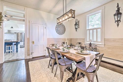 a dining room with a table and chairs at Lush, Modern Farmhouse with Mtn Views and Sunroom in Edinburg