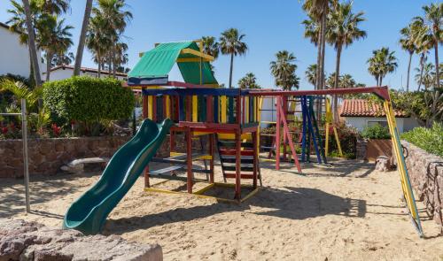 Children's play area sa Great Beach Swiming Pools Tennis Courts Condo in La Paloma Rosarito Beach