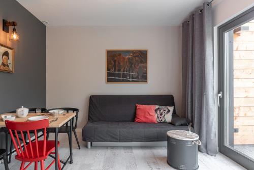 Posezení v ubytování Noclegi LIW APARTMENTS Hotel Apartamenty