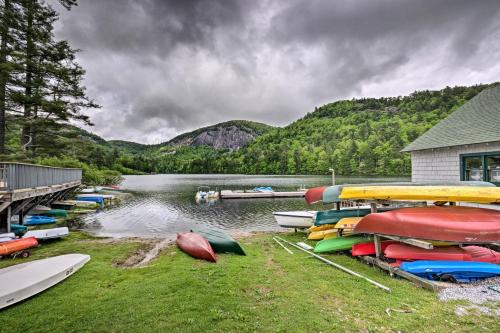 a bunch of boats are parked next to a body of water at Sapphire Valley Cabin with Private Mountain Views! in Sapphire