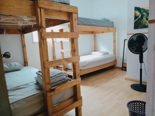 Postel nebo postele na pokoji v ubytování Hostal a 10 min del centro de Veracruz