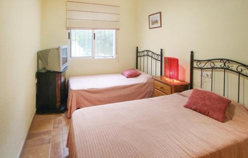 Voodi või voodid majutusasutuse Villa Ismael by Rental Olé toas