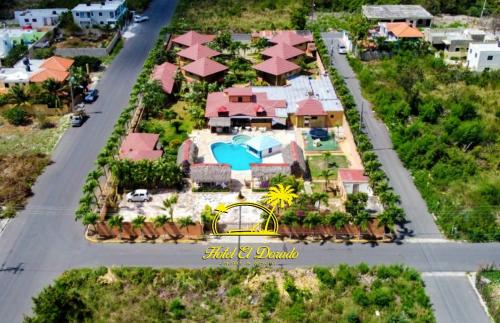 arial view of a house with a resort at Hotel El Dorado in La Romana