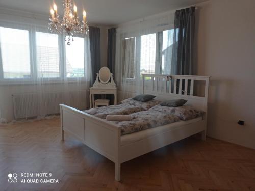 Postel nebo postele na pokoji v ubytování Ubytování v soukromí u Jarušky na Moravě