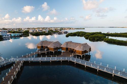 an aerial view of a resort on the water at Lina Point Belize Overwater Resort in San Pedro