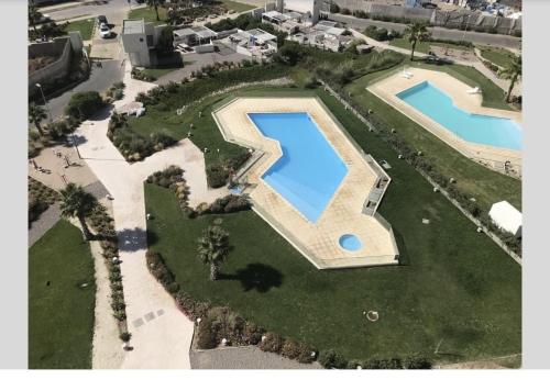 an overhead view of a large swimming pool on an estate at Marina Casino Playa in Coquimbo