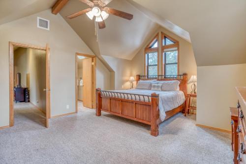 a bedroom with a bed and a ceiling fan at Yankee Mountain 9 - Meredith Lodging in Sunriver