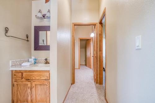 a bathroom with a sink and a mirror at Yankee Mountain 9 - Meredith Lodging in Sunriver
