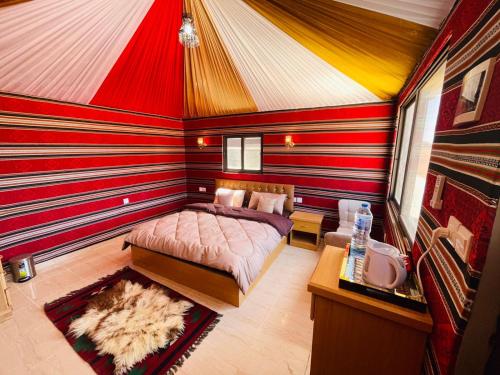 a room with a bed and a sink in a room at Rum Magic Nights in Wadi Rum