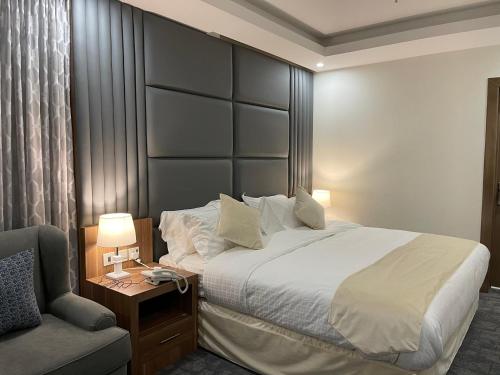 Katil atau katil-katil dalam bilik di دارا جازان للشقق المخدومة Dara Jazan Serviced Apartments