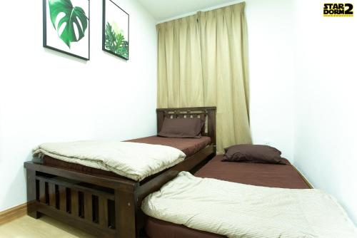 Katil atau katil-katil dalam bilik di Ipoh City Center Stardorm 2 Ipoh Homestay