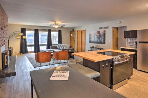 a large kitchen and living room in a apartment at Sleek Deadwood Getaway Less Than 1 Mi to Downtown! in Deadwood