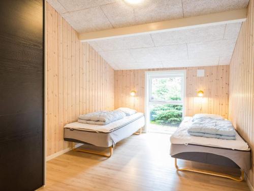 Postel nebo postele na pokoji v ubytování Holiday home Oksbøl LXXXI