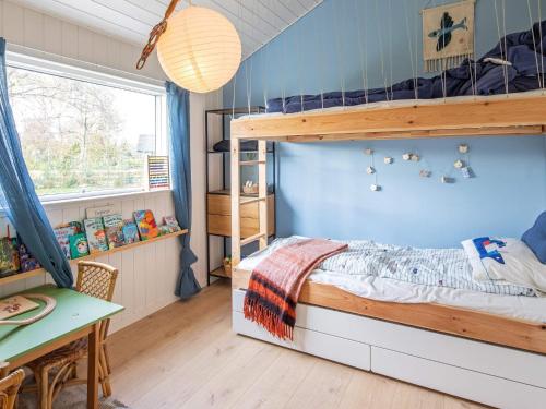 Postel nebo postele na pokoji v ubytování Holiday home Væggerløse CCX