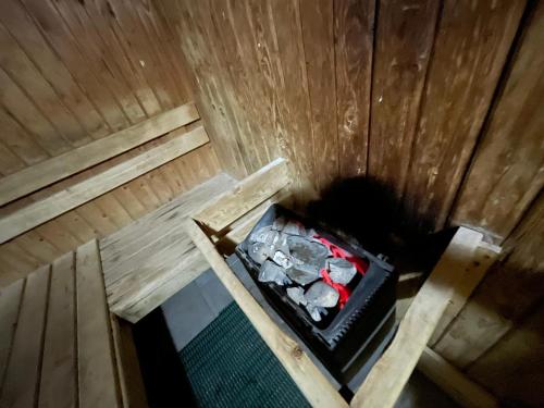 an overhead view of a room in a wooden cabin at מול הים בקיסריה1 in Caesarea