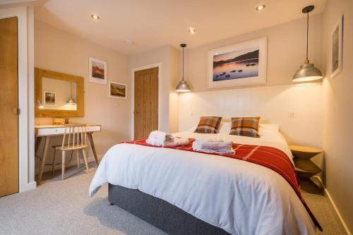 Un pat sau paturi într-o cameră la Howe Keld 6 Second Floor