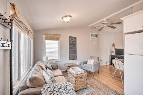 a living room with a couch and a chair at Bright Belmar Cottage Less Than Half Mi to Boardwalk! in Belmar