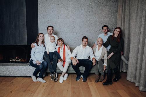 a large group of people sitting on a couch at Langwies Genussherberge in Hallein