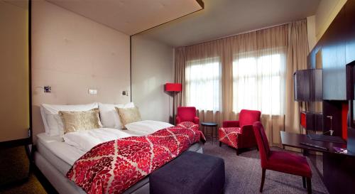 Postel nebo postele na pokoji v ubytování Home Hotel Folketeateret