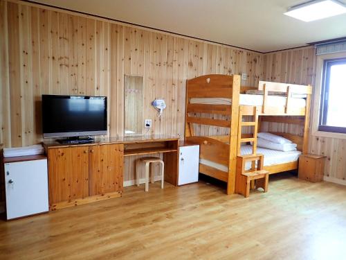 Postel nebo postele na pokoji v ubytování Galeum Guesthouse