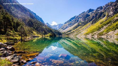 a mountain lake in the middle of a valley at Bungalow de 2 chambres a Cauterets a 900 m des pistes avec jardin amenage et wifi in Cauterets