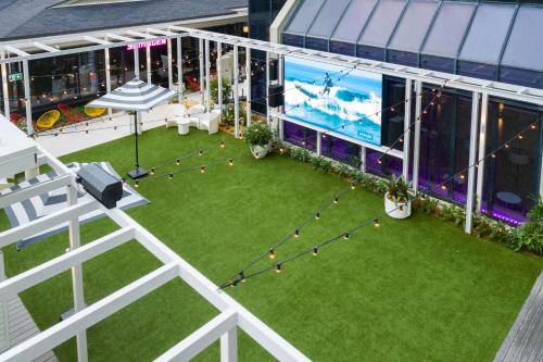 an aerial view of a patio on a cruise ship at QT Gold Coast in Gold Coast