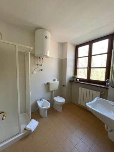 Kylpyhuone majoituspaikassa Foresteria La Rubbianetta