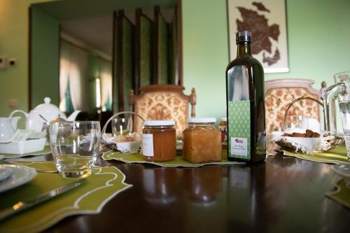 a bottle of wine sitting on top of a table at Agriturismo Petrara in Simeri