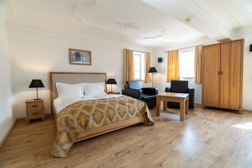 Postel nebo postele na pokoji v ubytování Hotel Hahnmühle 1323