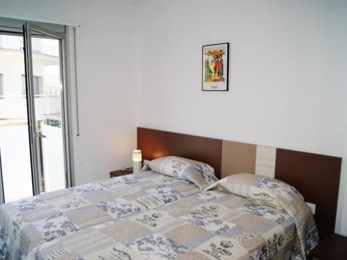 Posteľ alebo postele v izbe v ubytovaní Urpa Apartaments