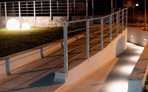 a row of bleachers in a stadium at night at Palacio del Sol Luxury Apartments in Nafplio