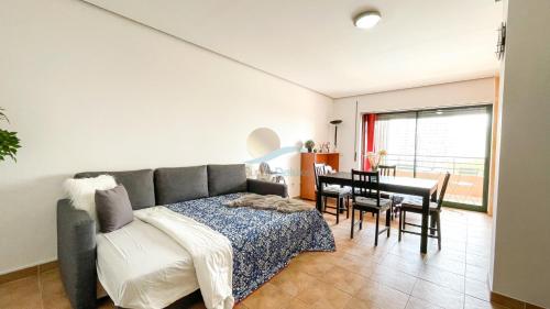 Postel nebo postele na pokoji v ubytování Sol da Rocha Studio by Sunny Deluxe